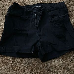 Used Black High Wasted KanCan size 7/27 shorts.